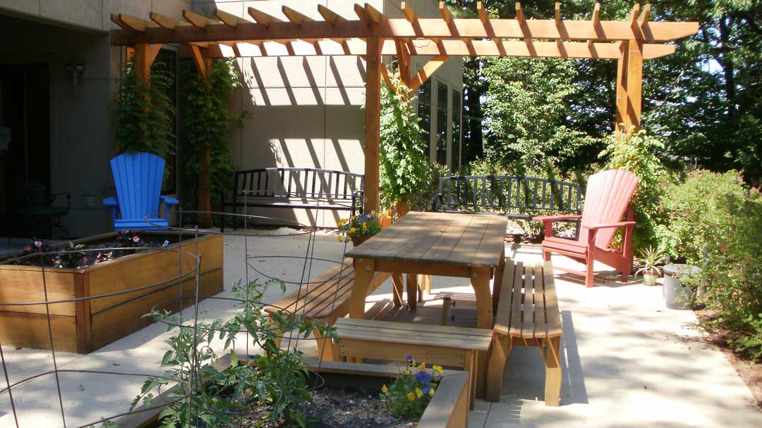 Beautiful community patio space with gardens